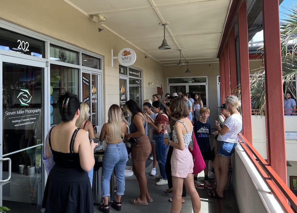 Dozens line up outside Wafu at the East End Market for the shops grand opening on June 29