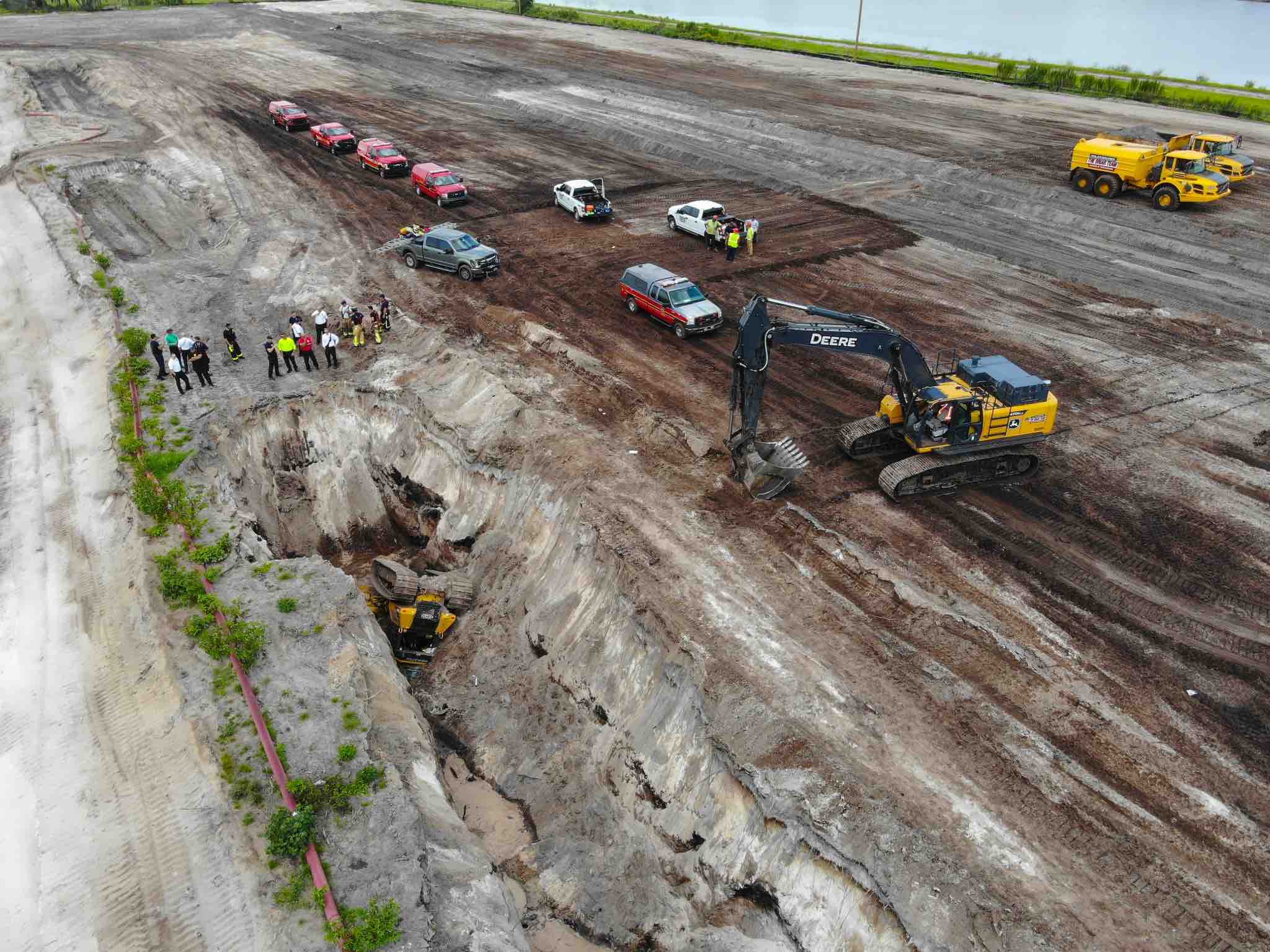 Bulldozer driver sustains significant injuries after vehicle flips down 20 foot embankment in east St. Cloud 1