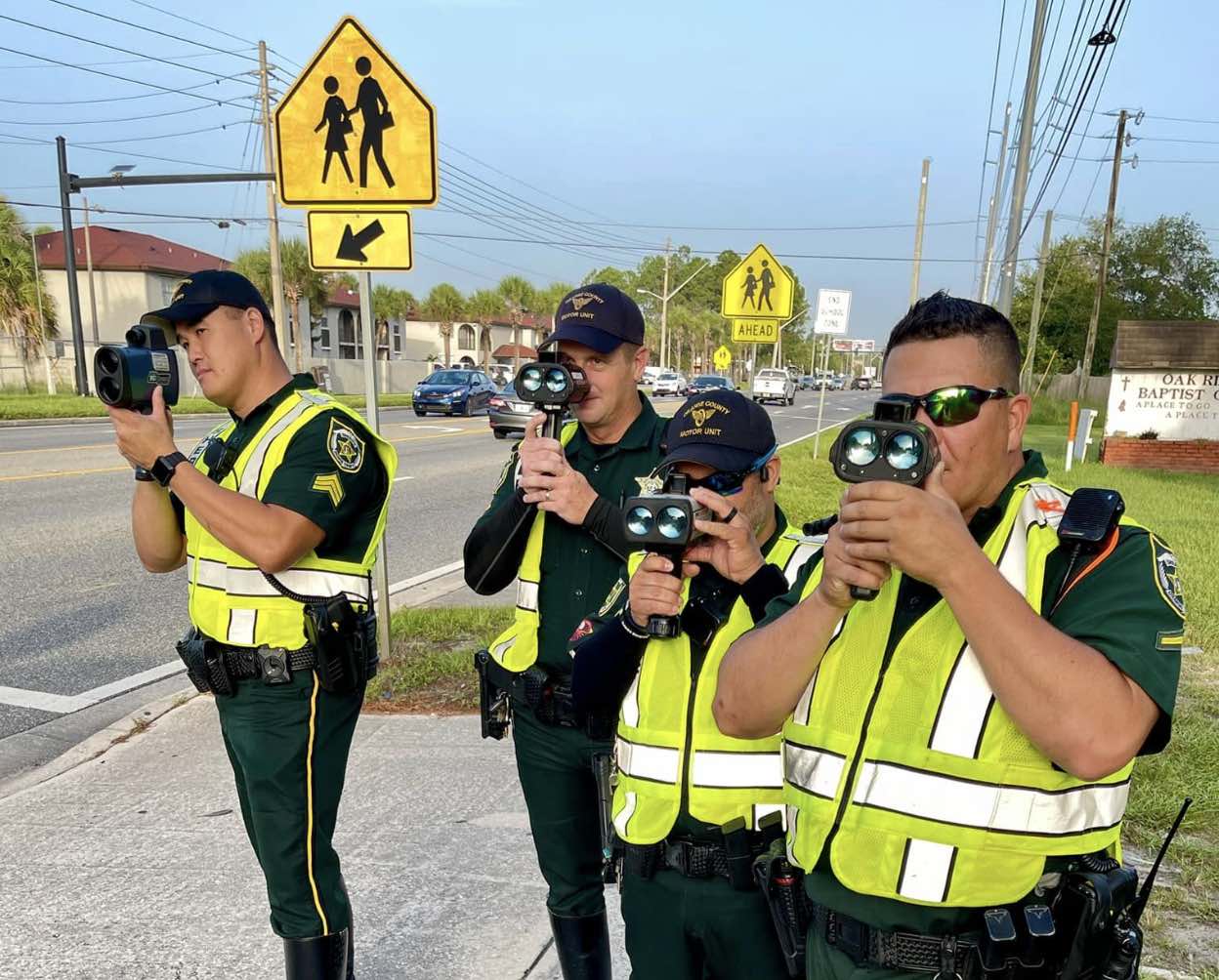 Orange County Sheriffs Office deputies clocking speeds with radar guns