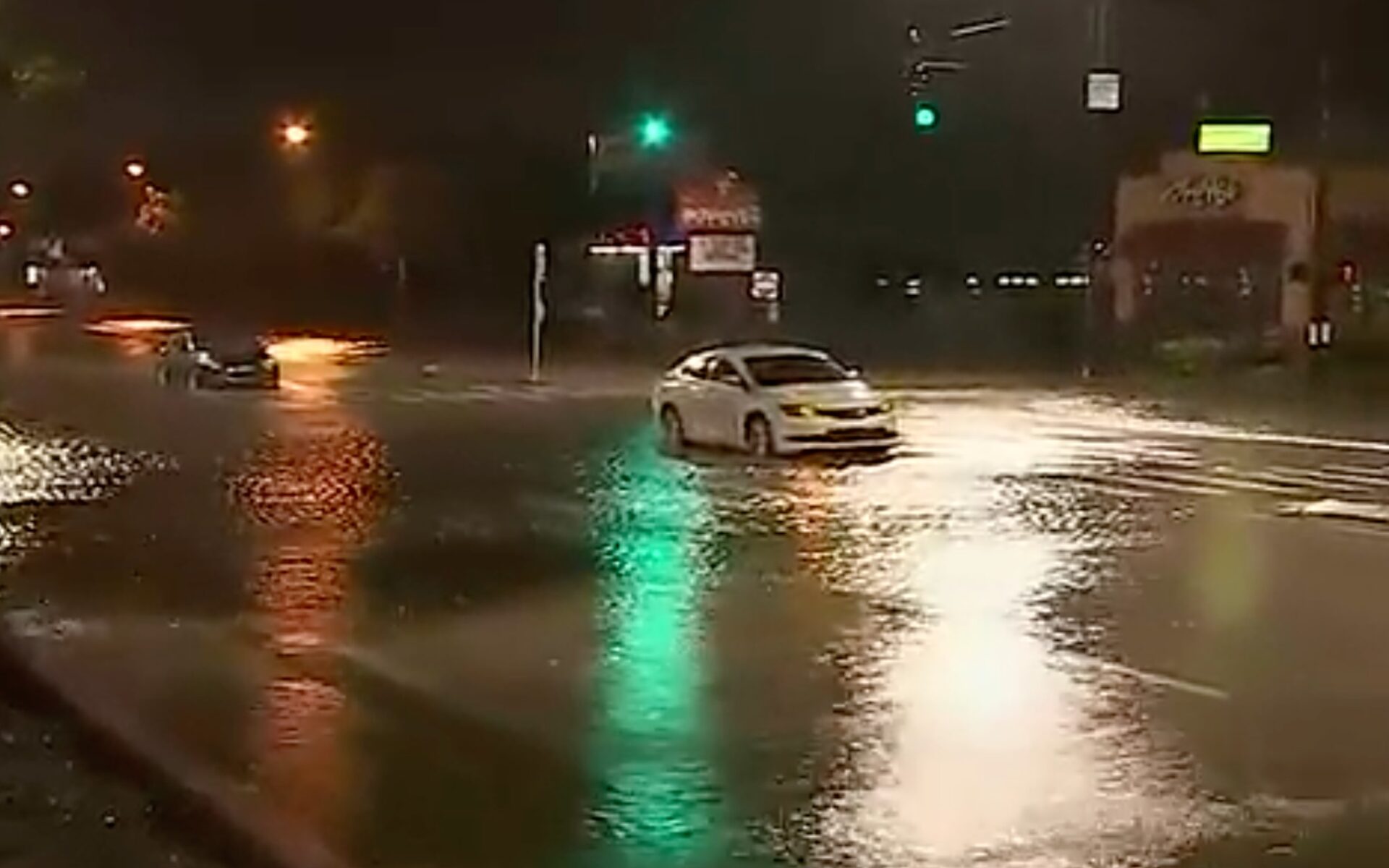 Turnpike, major thoroughfares, neighborhoods flooded around Orange ...