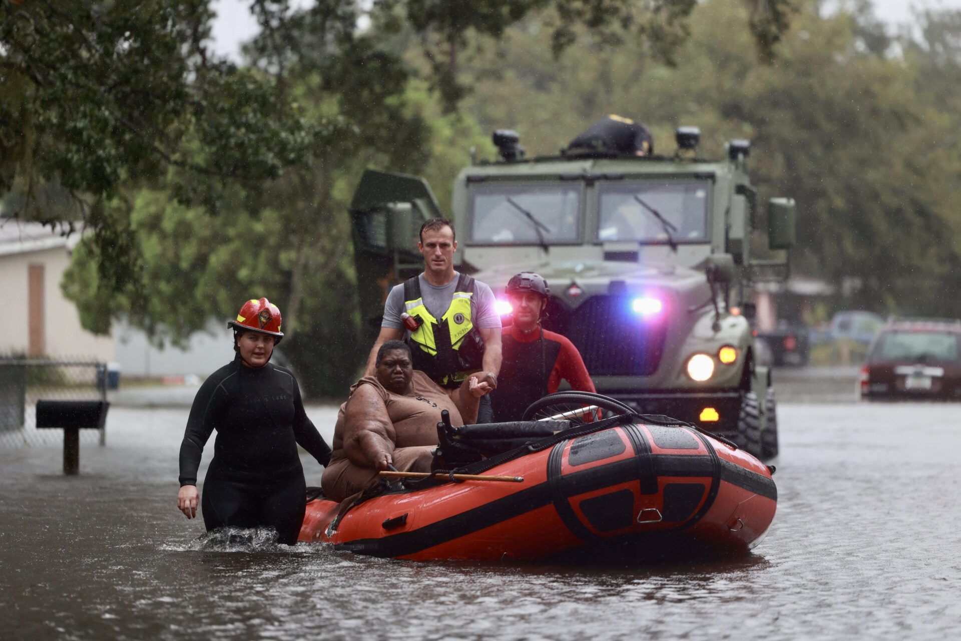 Woman being rescued by Orange County Sheriffs Deputies