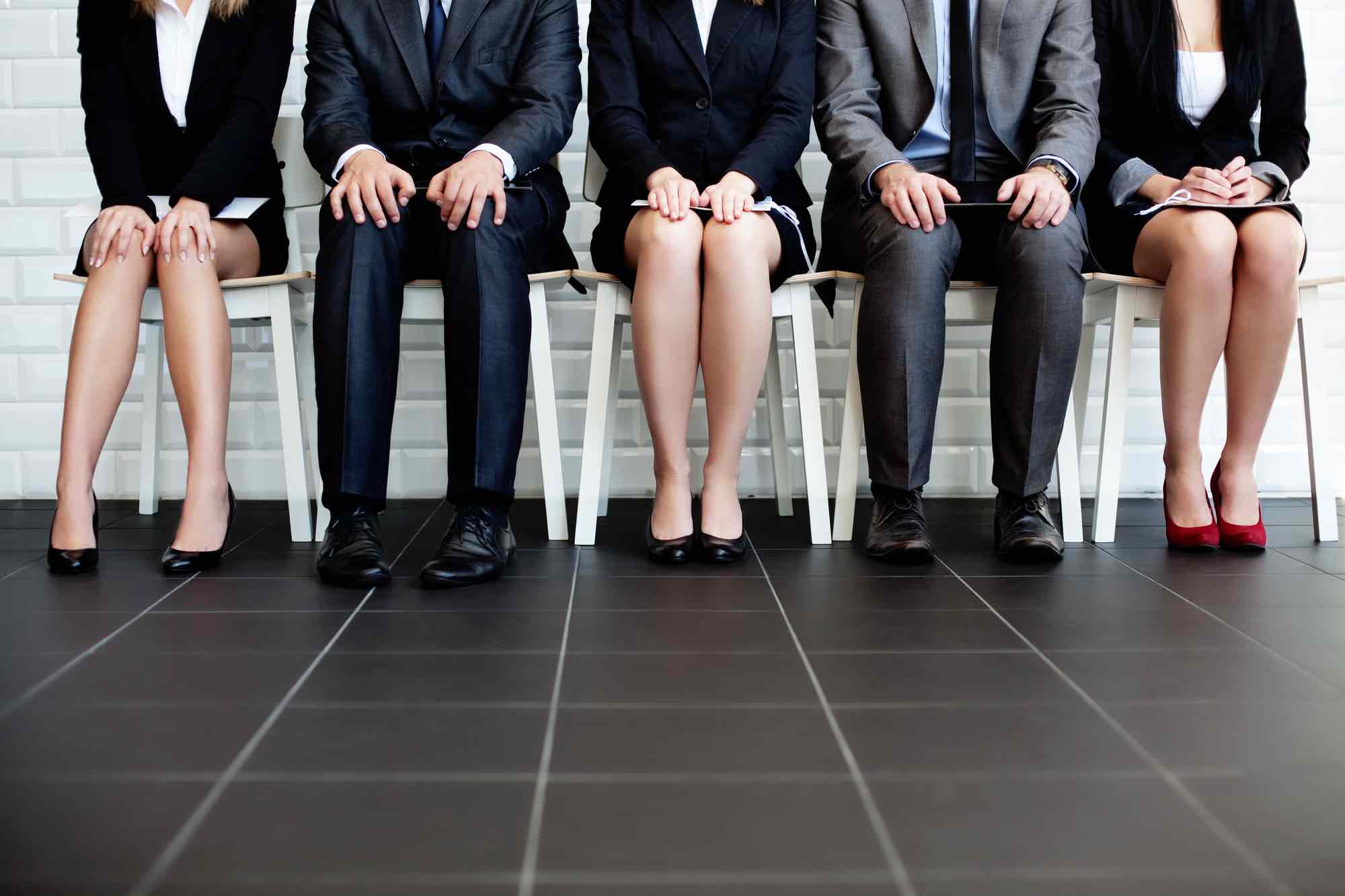 People waiting for job interview at hiring event