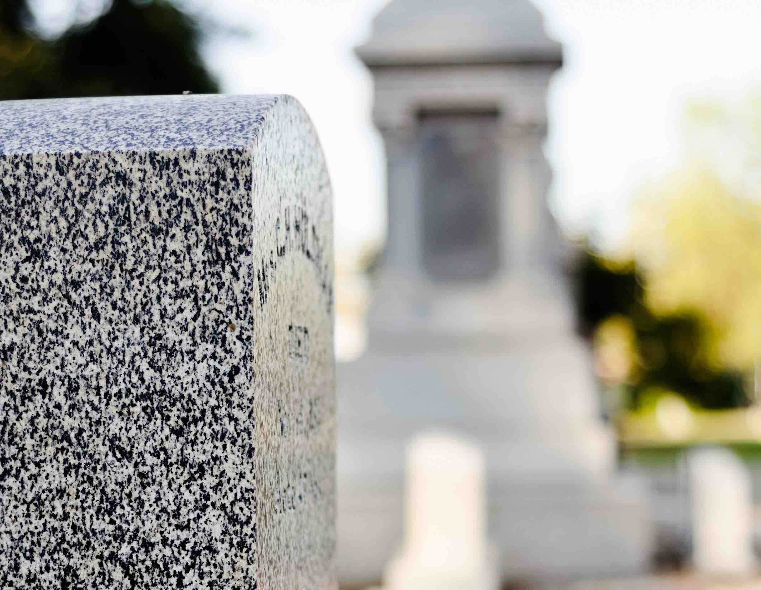 Closeup of headstone on tomb at cemetery