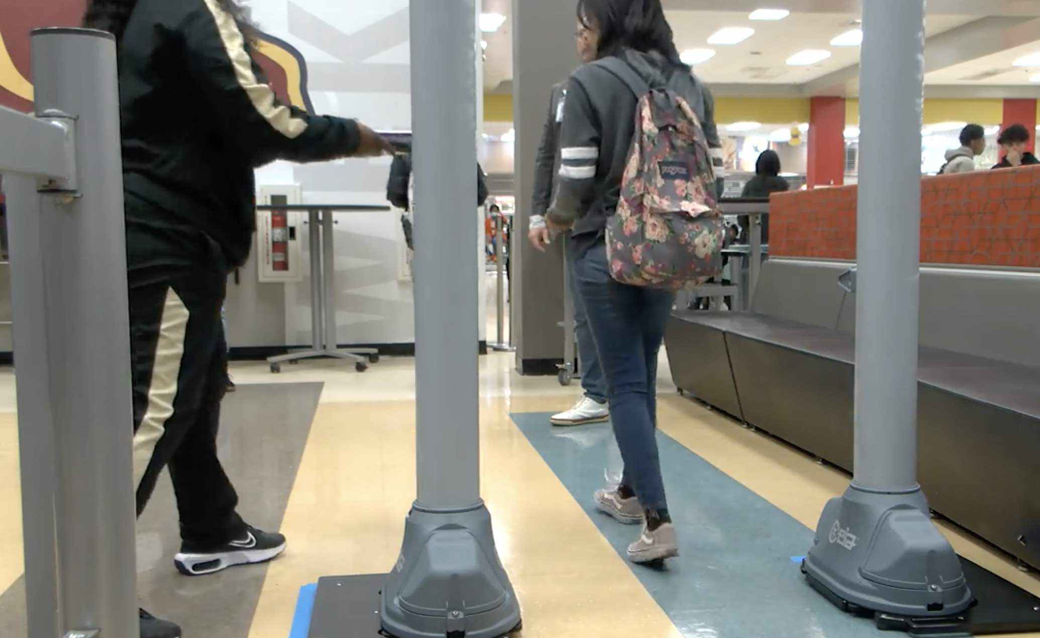 Students walk through weapons detection system in Orange County (1)