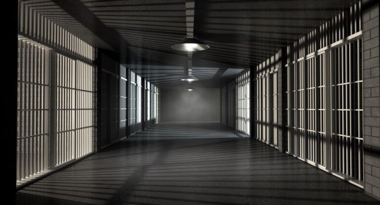 Prison corridor with jail cells